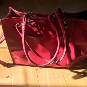 Great bag !  Lap top insert, purse, can hold files